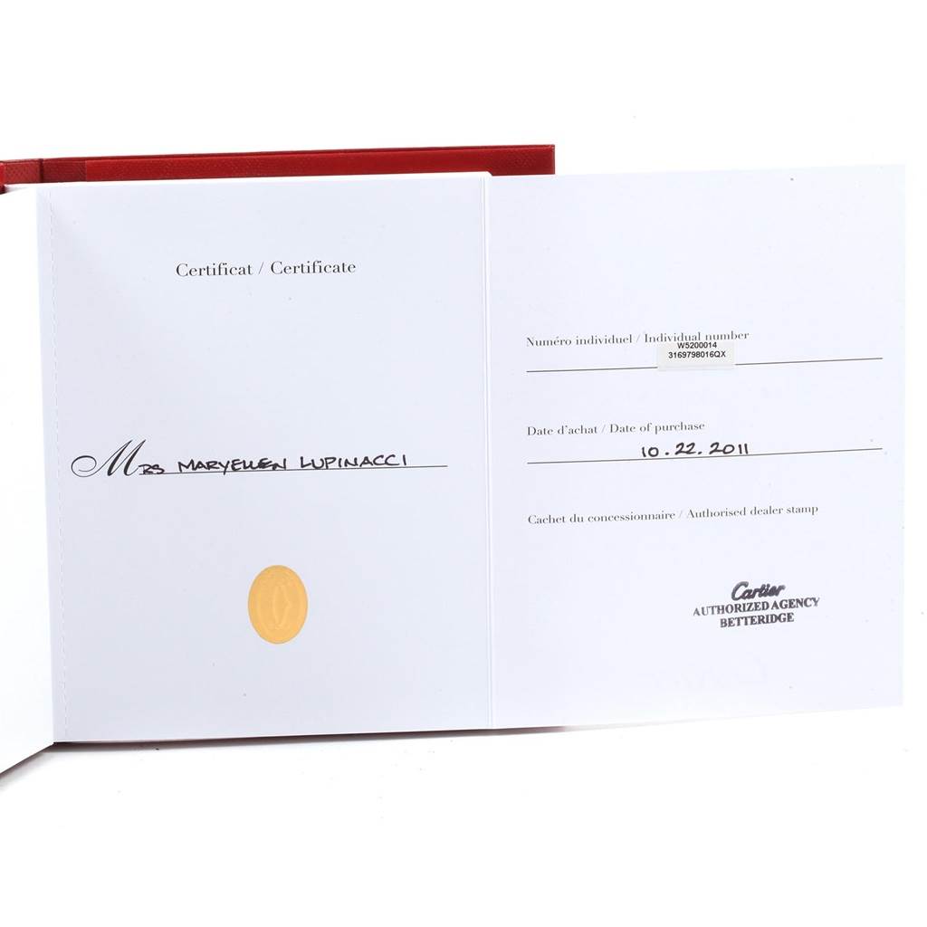 The image shows a certificate for the Cartier Tank Solo W5200014 Men
s Stainless Steel Silver Dial W5200014 Men
s Stainless Steel Silver Dial watch model, with purchase details and dealer stamp visible.