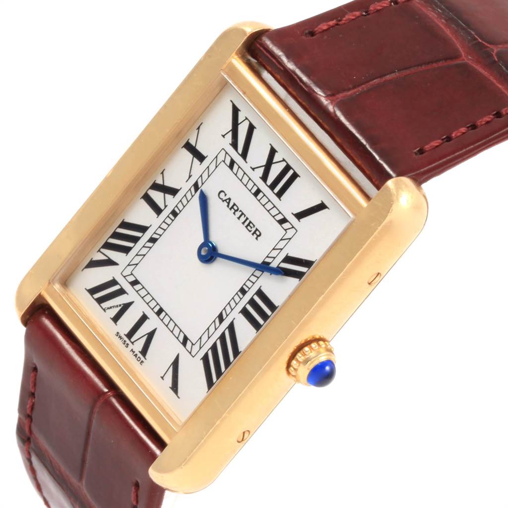 The image shows a Cartier Tank Solo W1018855 Men
s Steel and Gold (two tone) Silver Dial W1018855 Men
s Steel and Gold (two tone) Silver Dial watch from a front angle, highlighting its Roman numeral dial, gold case, and brown leather strap.