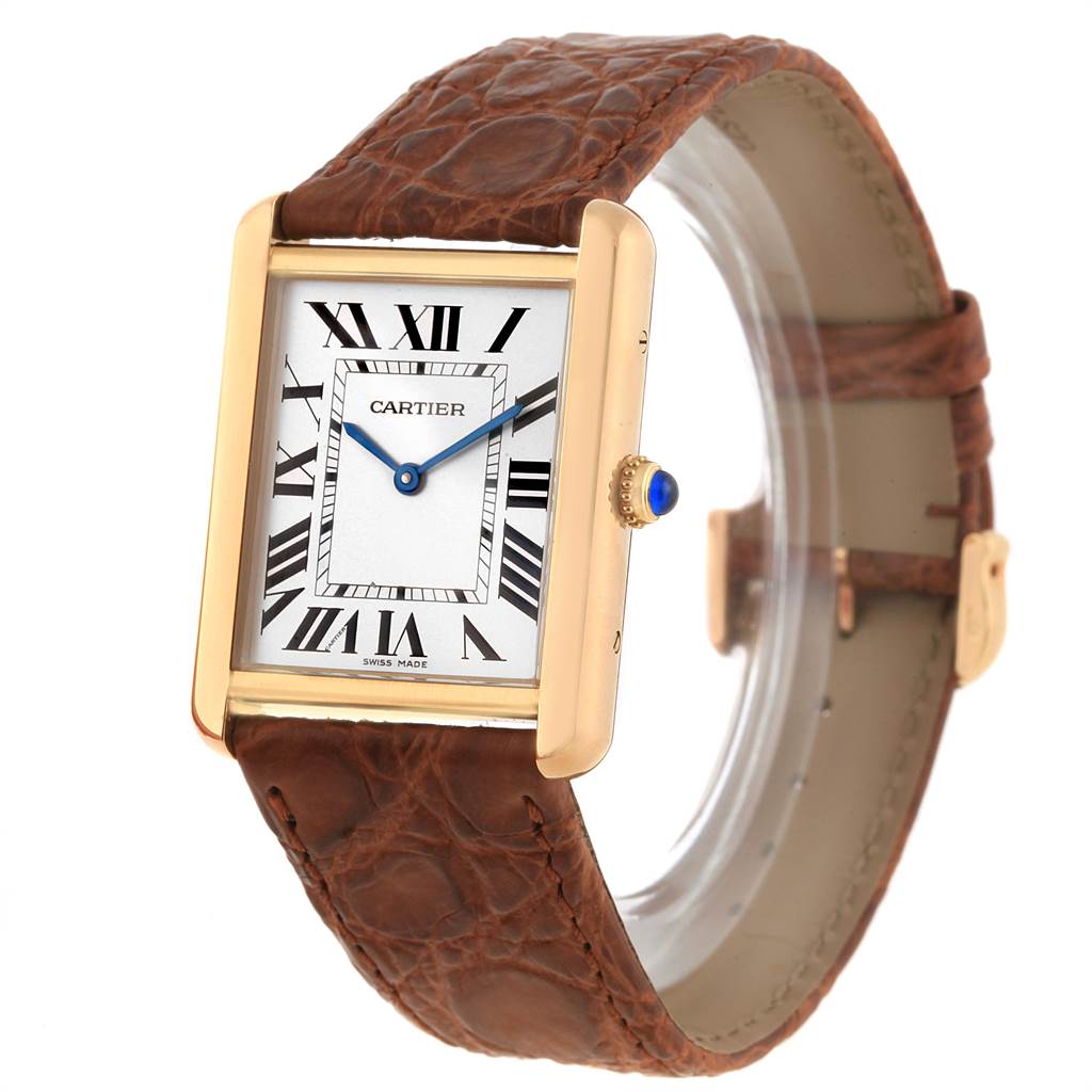 The Cartier Tank Solo W1018855 Men
s Steel and Gold (two tone) Silver Dial W1018855 Men
s Steel and Gold (two tone) Silver Dial watch is shown at a slight angle, featuring its square face, brown leather strap, and gold casing.