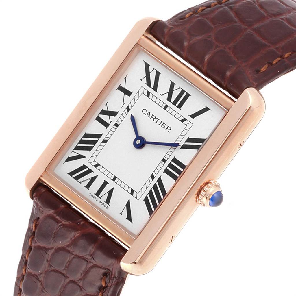The Cartier Tank Solo W5200025 Men
s Steel and Gold (two tone) Silver Dial W5200025 Men
s Steel and Gold (two tone) Silver Dial watch is shown at an angled view displaying the dial, crown, and part of the leather strap.