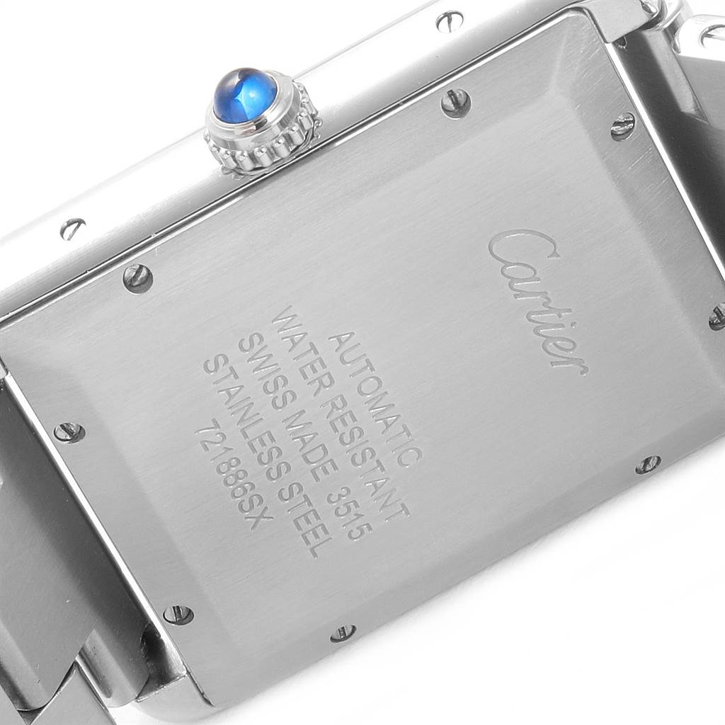 This image shows the back case of a Cartier Tank Solo W5200028 Men
s Stainless Steel Silver Dial W5200028 Men
s Stainless Steel Silver Dial watch, along with a side view of the crown.