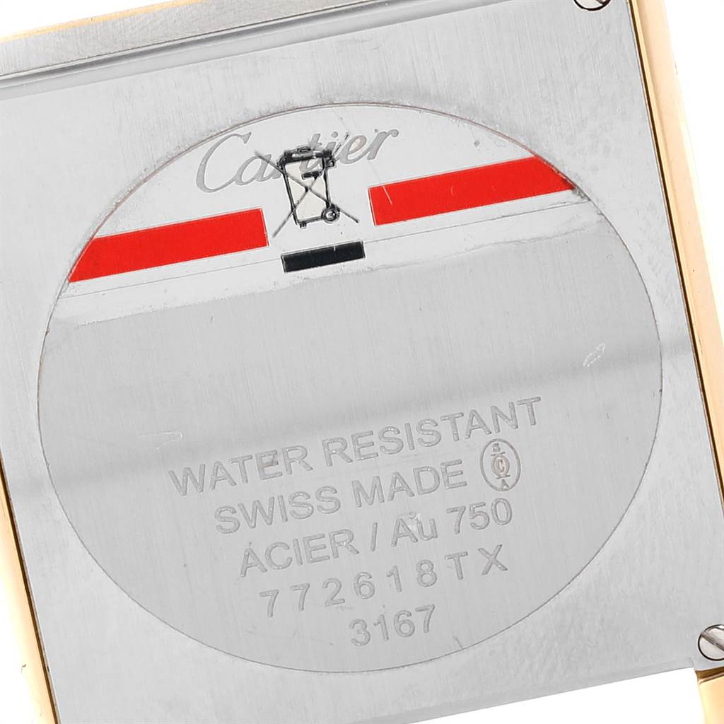 The image shows the back case of a Cartier Tank Solo W1018855 Men
s Steel and Gold (two tone) Silver Dial W1018855 Men
s Steel and Gold (two tone) Silver Dial watch, featuring water resistance and Swiss-made specifications.