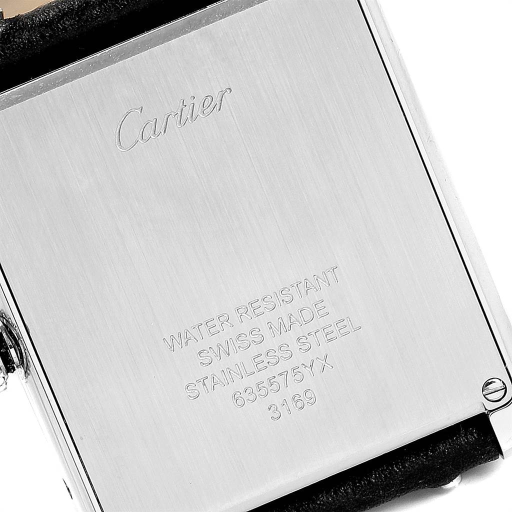 The image shows the back casing of a Cartier Tank Solo W1018355 Men
s Stainless Steel Silver Dial W1018355 Men
s Stainless Steel Silver Dial watch at a close-up angle, highlighting the engraved text.