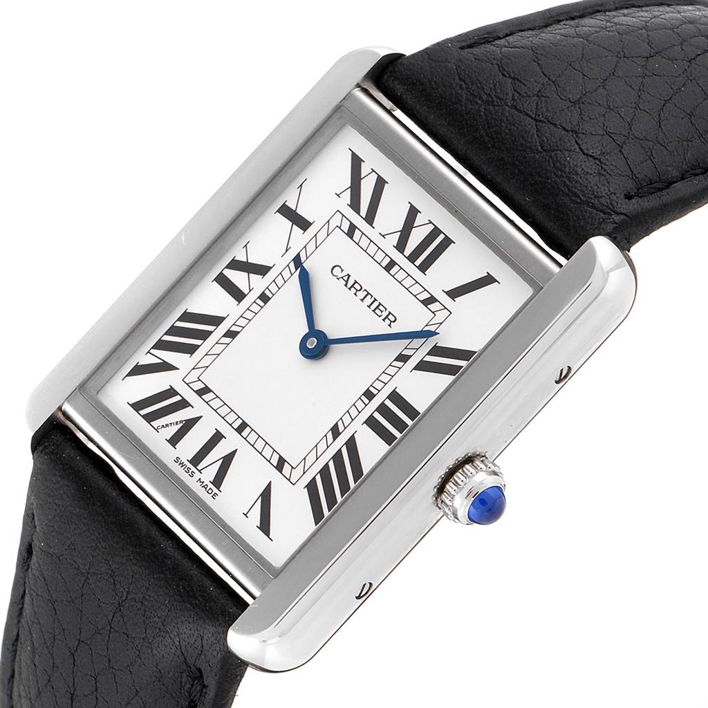 The image shows a Cartier Tank Solo W1018355 Men
s Stainless Steel Silver Dial W1018355 Men
s Stainless Steel Silver Dial watch at an angle, highlighting its face, crown, and black leather strap.