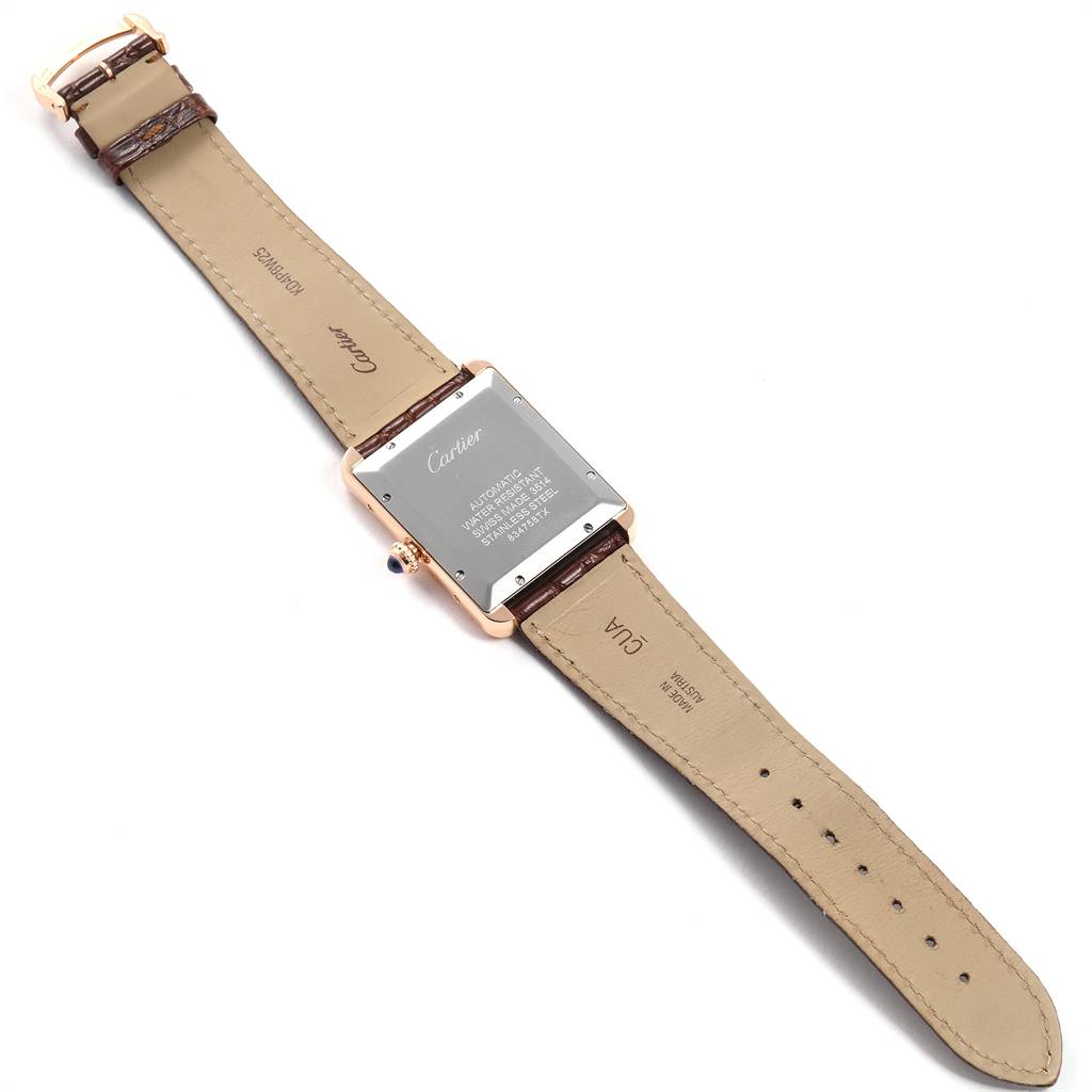 The image shows the back view of a Tank Solo model by Cartier, displaying the strap and case back.