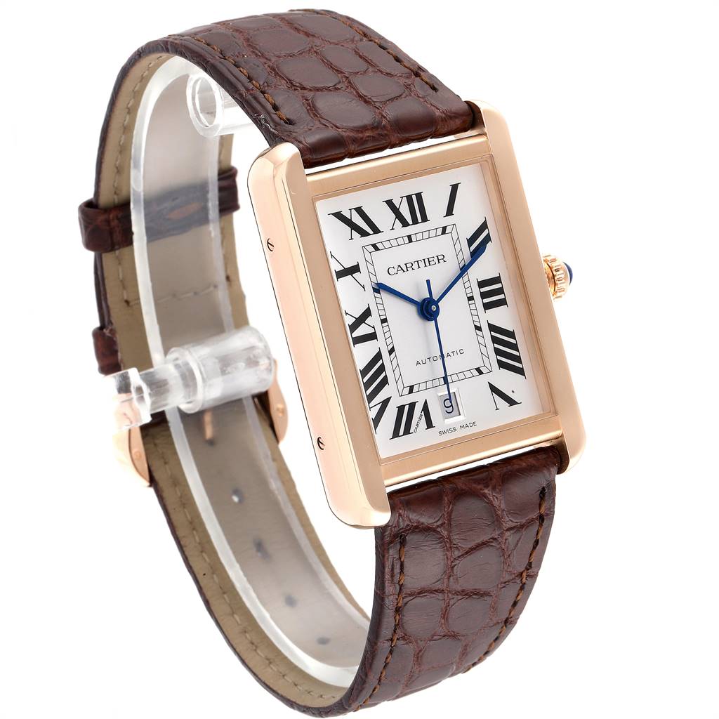 The Cartier Tank Solo W5200026 Men's Steel and Gold (two tone) Silver Dial W5200026 Men's Steel and Gold (two tone) Silver Dial watch is shown at an angle with a focus on the face, brown strap, and gold rectangular frame.