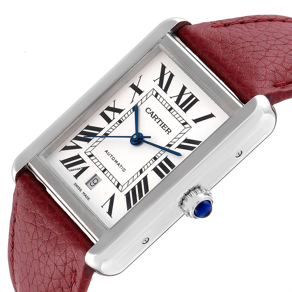 The image shows a Cartier Tank Solo W5200027 Men's Stainless Steel Silver Dial W5200027 Men's Stainless Steel Silver Dial watch at an angled close-up, displaying its face, crown with a blue gemstone, and a red leather strap.
