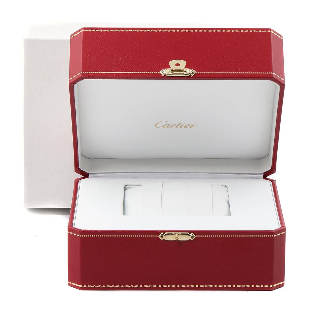 The image shows an open Cartier box, likely for a Tank Solo model watch, highlighting the brand's name and packaging.