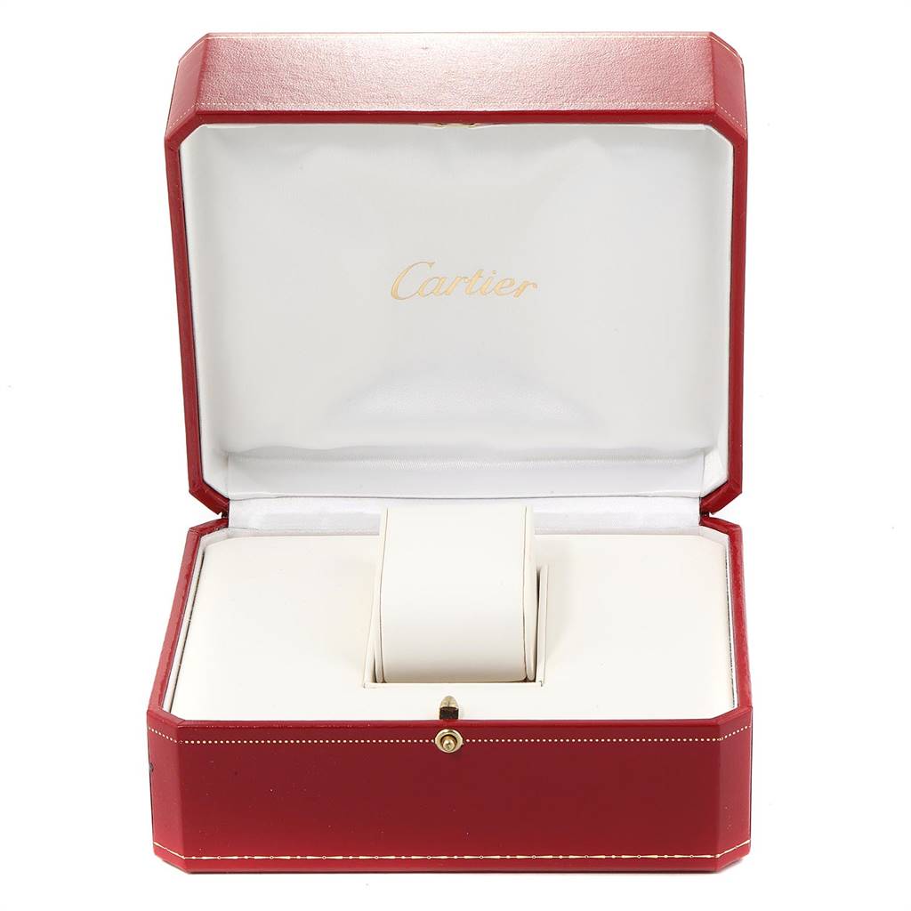This image shows an open red box of the Tank Solo model by Cartier, with a cushioned interior for holding the watch.