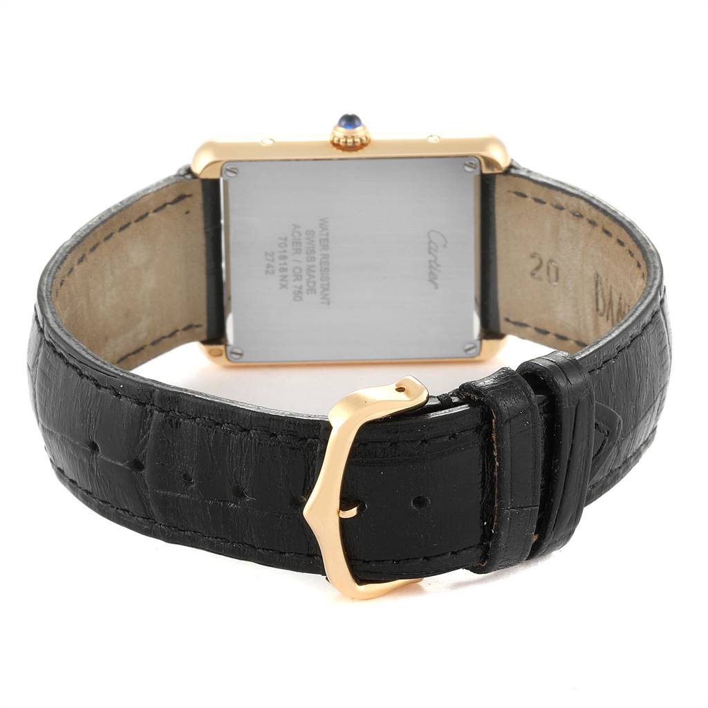 The image shows the back view of a Cartier Tank Solo W1018855 Men's Steel and Gold (two tone) Silver Dial W1018855 Men's Steel and Gold (two tone) Silver Dial watch, highlighting the case back, crown, and leather strap with buckle.