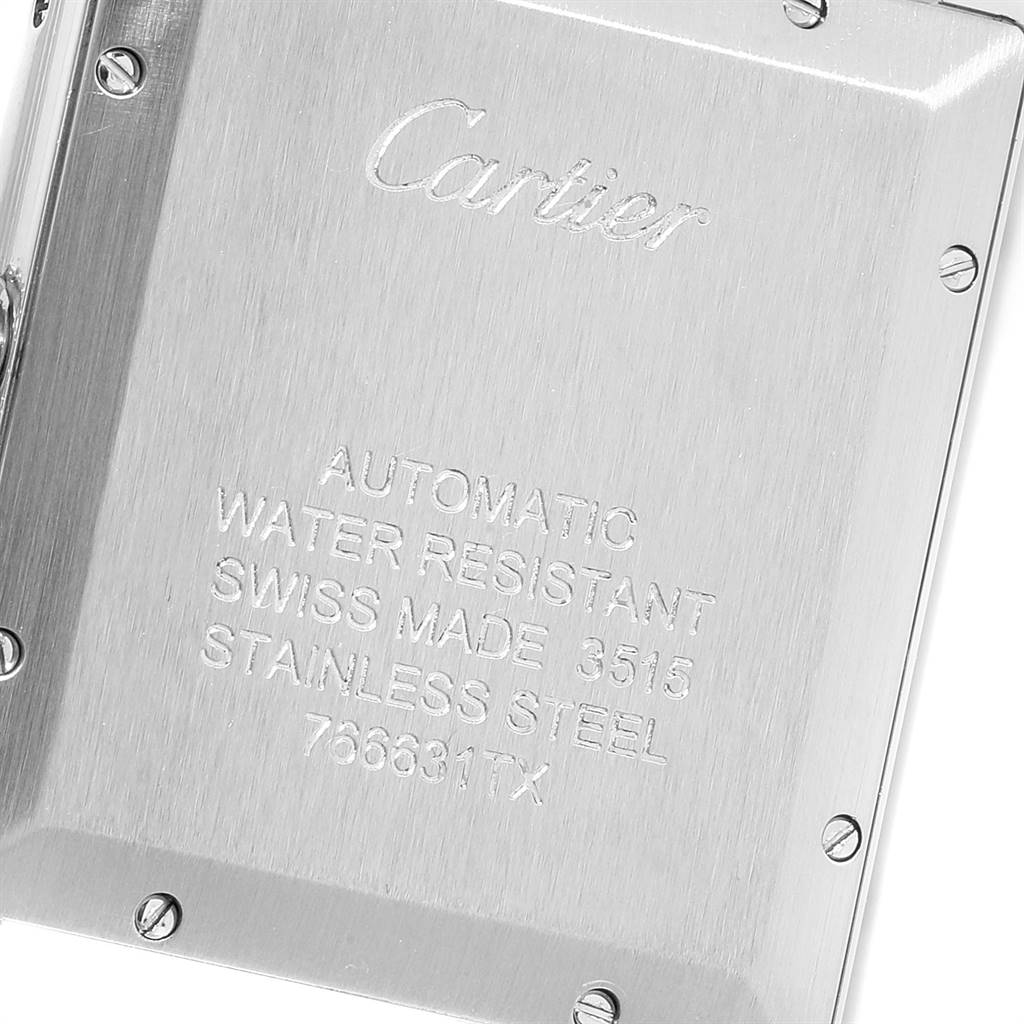 The image shows the back of a Cartier Tank Solo W5200028 Men's Stainless Steel Silver Dial W5200028 Men's Stainless Steel Silver Dial watch, displaying engravings and screws.