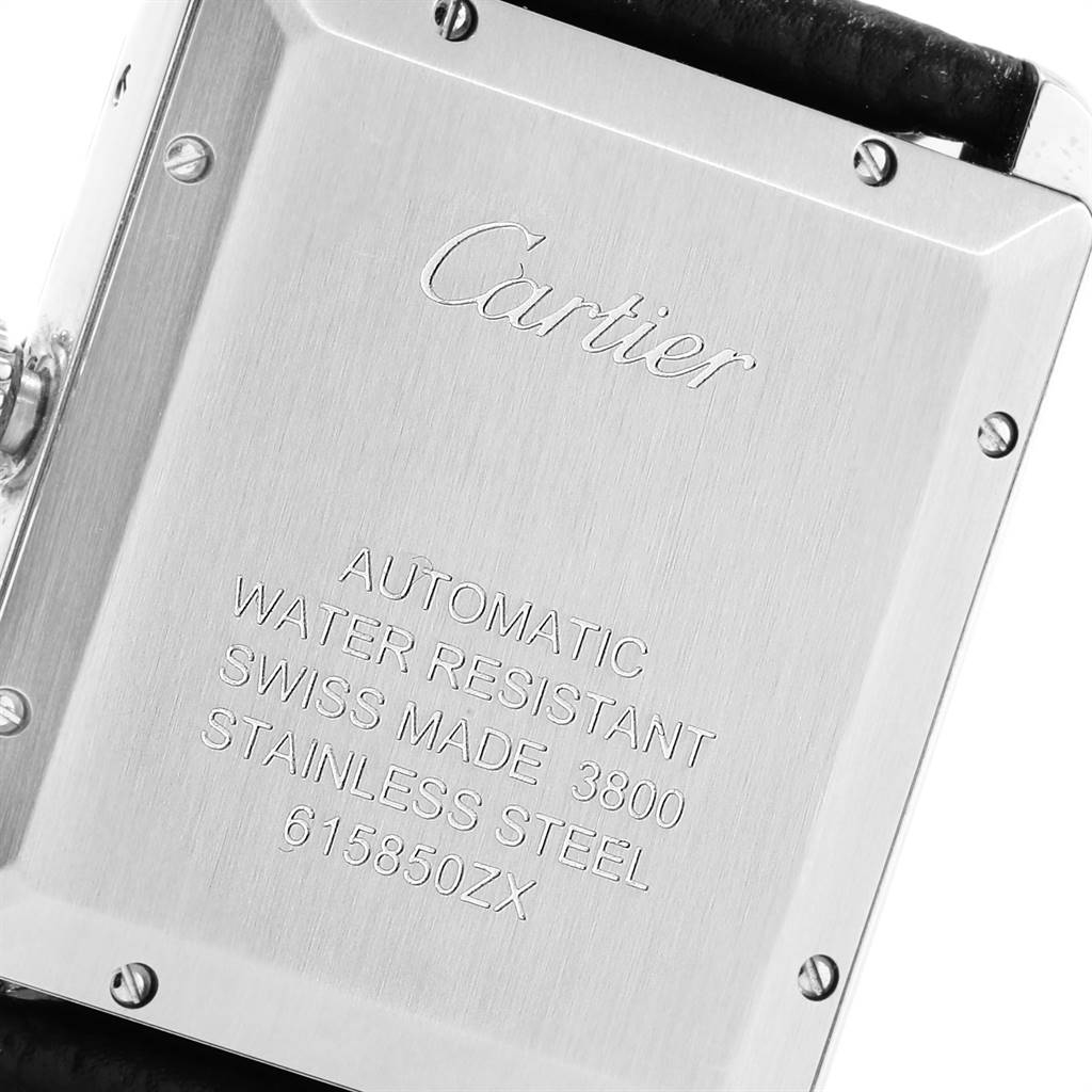 This image shows the back case of the Cartier Tank Solo W5200027 Men
s Stainless Steel Silver Dial W5200027 Men
s Stainless Steel Silver Dial watch, featuring engraved text detailing specifications.