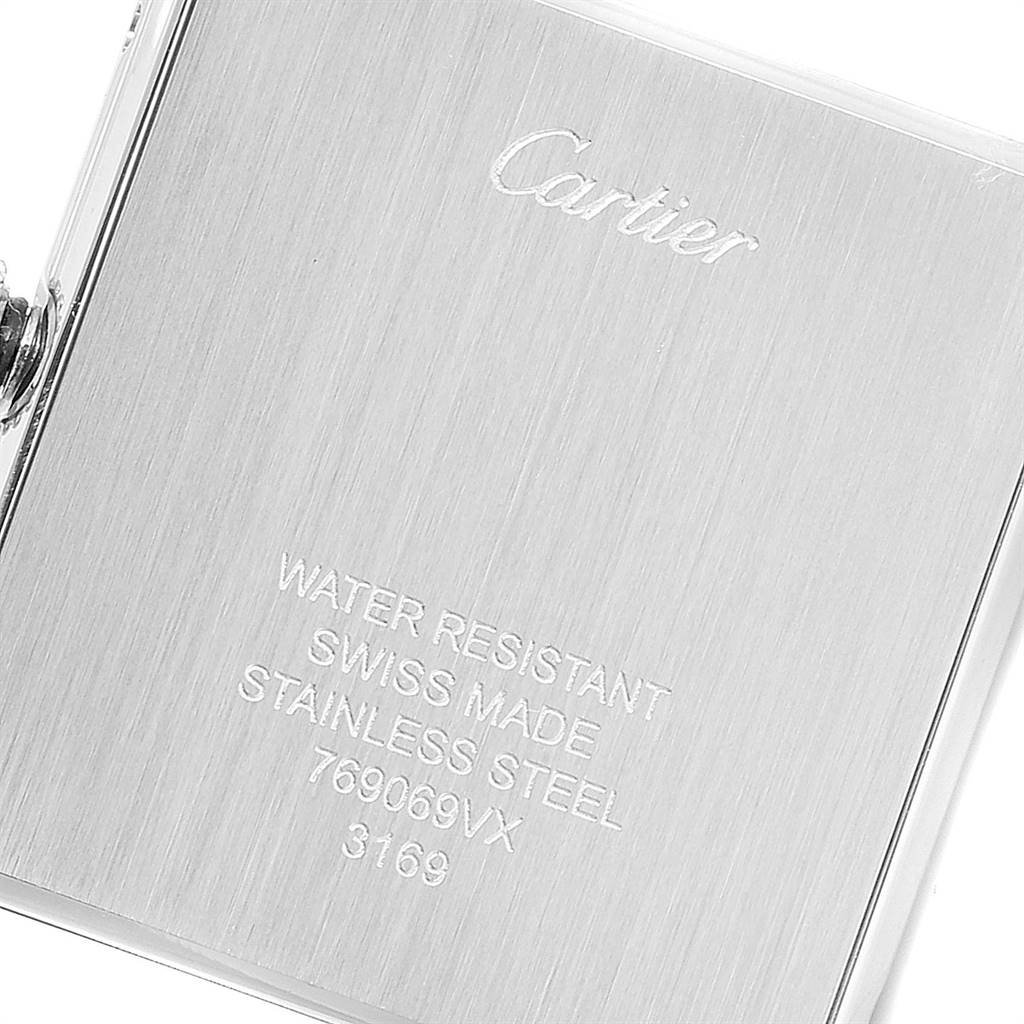 The image shows the engraved stainless steel back of a Cartier Tank Solo W1018355 Men
s Stainless Steel Silver Dial W1018355 Men
s Stainless Steel Silver Dial watch at an angled close-up.
