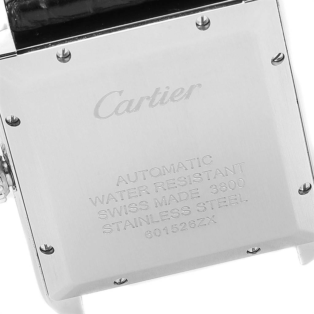 The image shows the back case of a Cartier Tank Solo W5200027 Men's Stainless Steel Silver Dial W5200027 Men's Stainless Steel Silver Dial watch, displaying engravings and part of the strap.