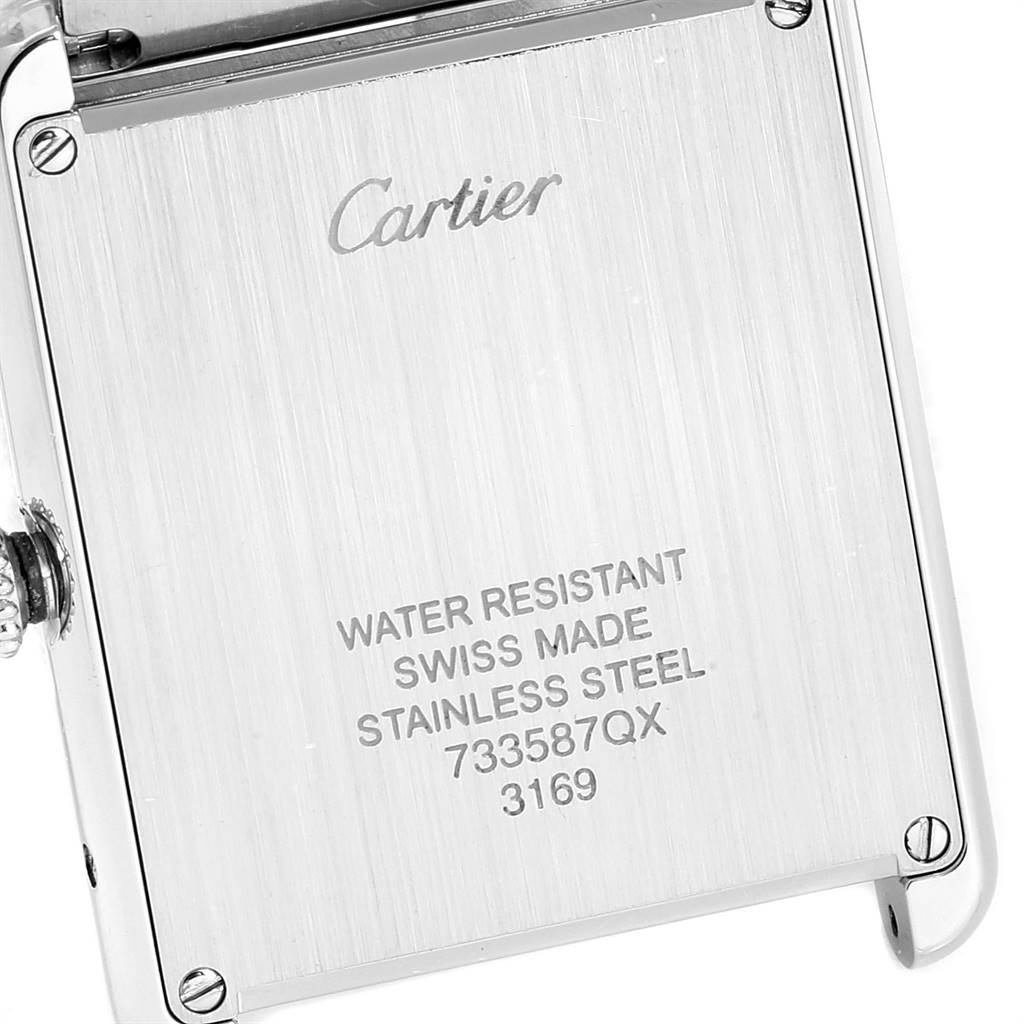The image shows the back case of a Cartier Tank Solo W5200014 Men
s Stainless Steel Silver Dial W5200014 Men
s Stainless Steel Silver Dial watch, displaying its engraved details.