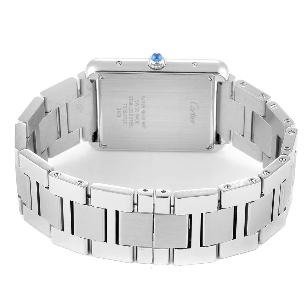 The image shows the back case and metal bracelet of a Cartier Tank Solo W5200014 Men
s Stainless Steel Silver Dial W5200014 Men
s Stainless Steel Silver Dial watch, with detailed engravings visible.