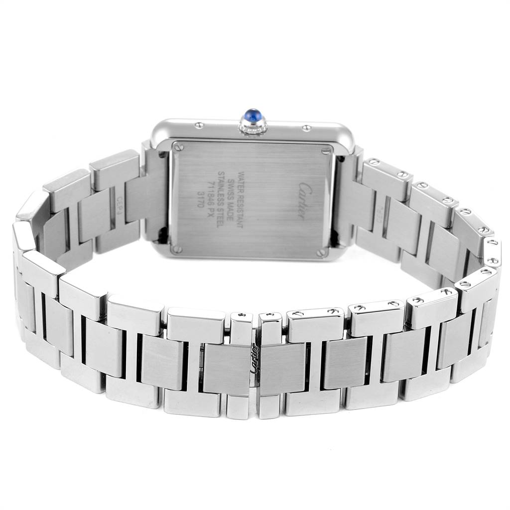 The image shows the back of the Cartier Tank Solo W5200013 Women
s Stainless Steel Silver Dial W5200013 Women
s Stainless Steel Silver Dial watch and its stainless steel bracelet.