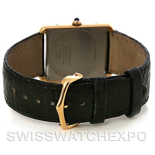 This image shows the back and buckle of a Cartier Tank Solo W1018855 Men
s Steel and Gold (two tone) Silver Dial W1018855 Men
s Steel and Gold (two tone) Silver Dial watch, highlighting the leather strap and clasp.