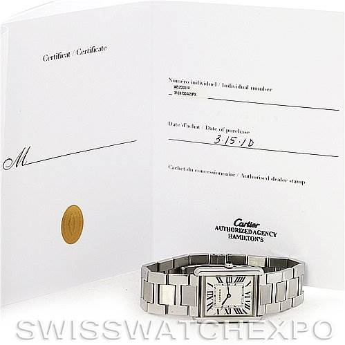 The image shows a Cartier Tank Solo W5200014 Stainless Steel Silver Dial W5200014 Stainless Steel Silver Dial watch with a stainless steel bracelet, displayed alongside its open certificate booklet.