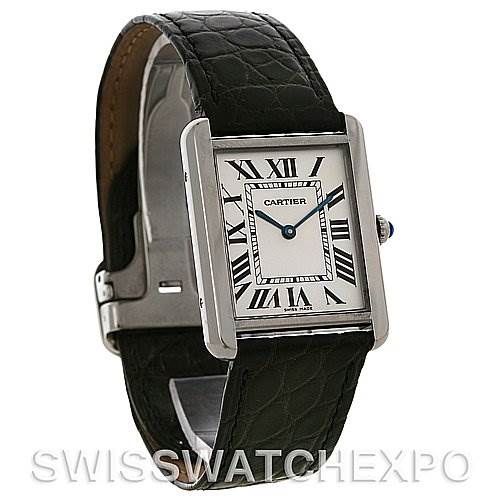 The image shows a Cartier Tank Solo W1018355 Men
s Stainless Steel Silver Dial W1018355 Men
s Stainless Steel Silver Dial watch at a three-quarter angle with a focus on the dial and leather strap.
