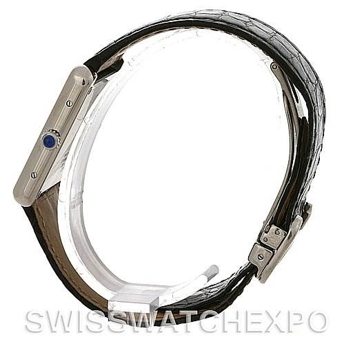 The image shows a side view of a Cartier Tank Solo W1018355 Men
s Stainless Steel Silver Dial W1018355 Men
s Stainless Steel Silver Dial watch, focusing on the crown, case side, and leather strap.