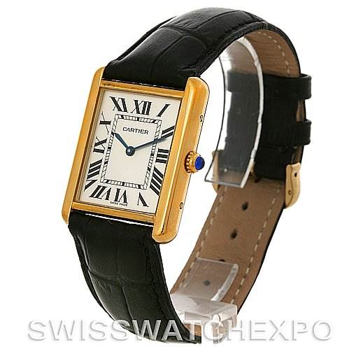 The image shows a Cartier Tank Solo W1018855 Men
s Steel and Gold (two tone) Silver Dial W1018855 Men
s Steel and Gold (two tone) Silver Dial watch at an angled view, highlighting the face, strap, and gold casing.
