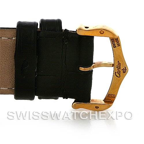 The image displays the gold buckle and part of the black leather strap of a Cartier Tank Solo W1018855 Men
s Steel and Gold (two tone) Silver Dial W1018855 Men
s Steel and Gold (two tone) Silver Dial watch.