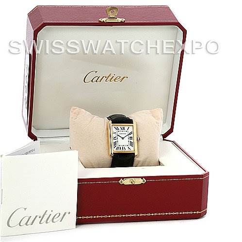The Cartier Tank Solo W1018855 Men
s Steel and Gold (two tone) Silver Dial W1018855 Men
s Steel and Gold (two tone) Silver Dial watch is shown front-facing inside a red Cartier box, with a booklet placed beside it.