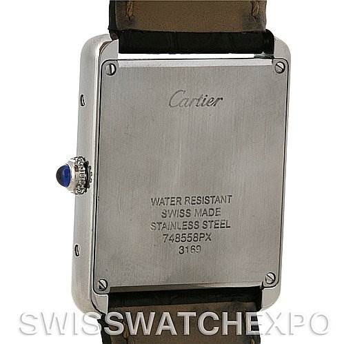 This image shows the back case and part of the strap of a Cartier Tank Solo W1018355 Men's Stainless Steel Silver Dial W1018355 Men's Stainless Steel Silver Dial watch, with visible engravings.