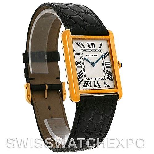 The image shows a Tank Solo model by Cartier from a front angle, displaying the watch face and black leather strap.