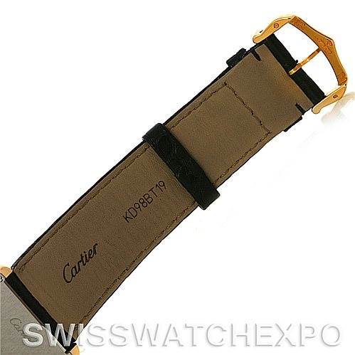The image shows the underside of the strap and buckle of a Cartier Tank Solo W1018855 Men
s Steel and Gold (two tone) Silver Dial W1018855 Men
s Steel and Gold (two tone) Silver Dial watch.