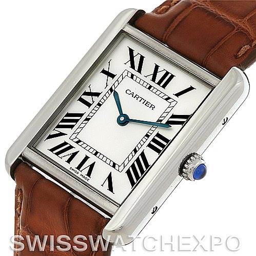 The image shows a close-up angled view of a Cartier Tank Solo W1018355 Men's Stainless Steel Silver Dial W1018355 Men's Stainless Steel Silver Dial watch, highlighting its face, bezel, and part of its brown leather strap.