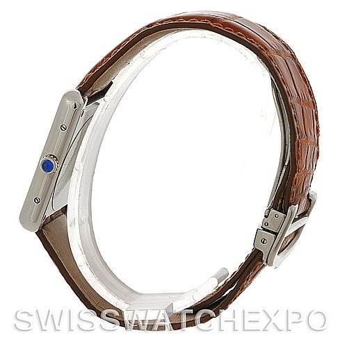 This image shows a side view of the Cartier Tank Solo W1018355 Men's Stainless Steel Silver Dial W1018355 Men's Stainless Steel Silver Dial watch, featuring the case, crown with a blue cabochon, and brown leather strap.