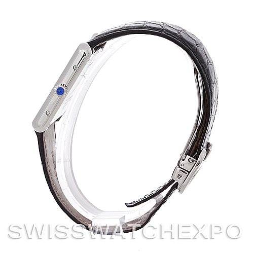 This image shows a side view of the Cartier Tank Solo W1018355 Men's Stainless Steel Silver Dial W1018355 Men's Stainless Steel Silver Dial watch, highlighting the crown and part of the strap and clasp.