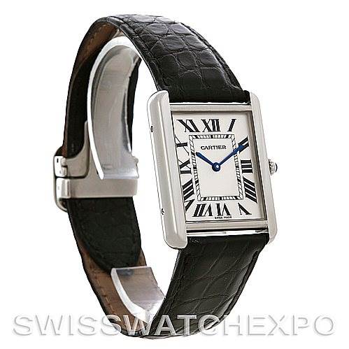 The image shows a Cartier Tank Solo W1018355 Men's Stainless Steel Silver Dial W1018355 Men's Stainless Steel Silver Dial watch angled to display its rectangular face, Roman numerals, and black leather strap.