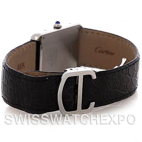 The image shows the back of the Cartier Tank Solo W1018355 Men's Stainless Steel Silver Dial W1018355 Men's Stainless Steel Silver Dial watch, highlighting the black leather strap and the clasp with Cartier’s logo.