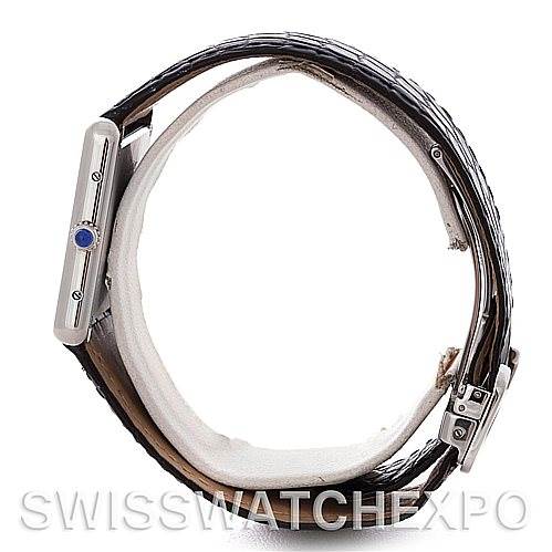 The image shows a side view of the Cartier Tank Solo W1018355 Men's Stainless Steel Silver Dial W1018355 Men's Stainless Steel Silver Dial watch highlighting its crown, case, and leather strap.