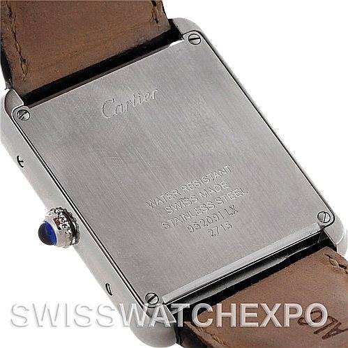 This image shows the back side of a Cartier Tank Solo W1018355 Men
s Stainless Steel Silver Dial W1018355 Men
s Stainless Steel Silver Dial watch, focusing on the case back and part of the leather strap.