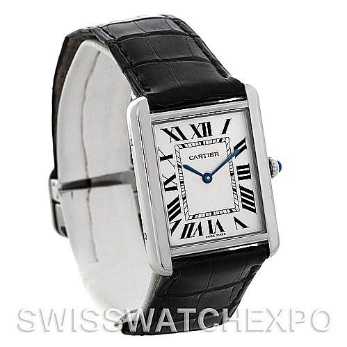 The image shows a Cartier Tank Solo W1018355 Men
s Stainless Steel Silver Dial W1018355 Men
s Stainless Steel Silver Dial watch from an angled front view, highlighting the rectangular face and leather strap.