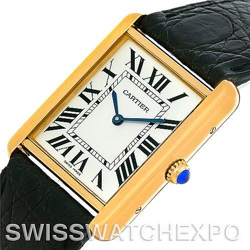 This image shows a Cartier Tank Solo W1018855 Men
s Steel and Gold (two tone) Silver Dial W1018855 Men
s Steel and Gold (two tone) Silver Dial watch at an angled view, highlighting its face, Roman numerals, and black leather strap.