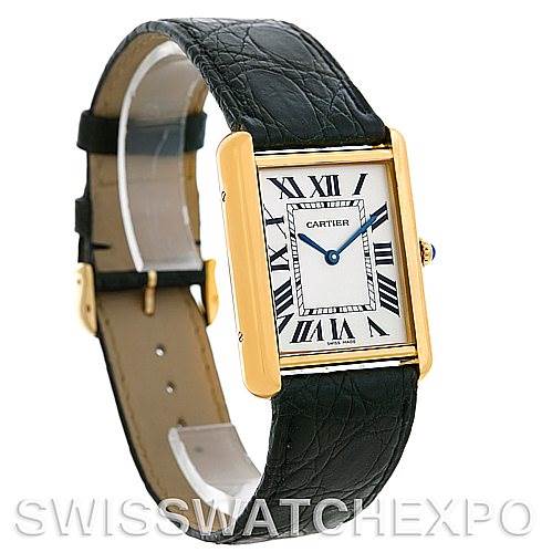 The image shows a Cartier Tank Solo W1018855 Men
s Steel and Gold (two tone) Silver Dial W1018855 Men
s Steel and Gold (two tone) Silver Dial watch from a front angled view, highlighting its face and leather strap.