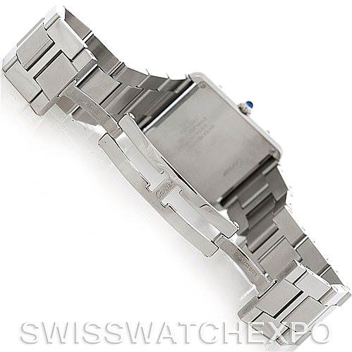 The image shows the backside and clasp of a Tank Solo model watch by Cartier, highlighting the metal bracelet and clasp mechanism.