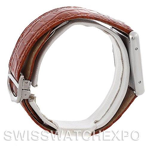 The image shows a side view of a Cartier Tank Solo W1018355 Men
s Stainless Steel Silver Dial W1018355 Men
s Stainless Steel Silver Dial watch with its brown leather strap and stainless steel buckle.
