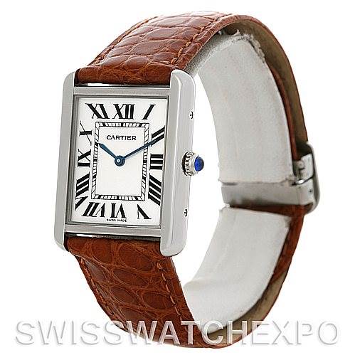 This image shows a Cartier Tank Solo W1018355 Men
s Stainless Steel Silver Dial W1018355 Men
s Stainless Steel Silver Dial watch, displaying the face, case, crown, and brown leather strap from the front-left angle.