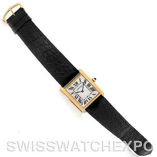 This image shows the Cartier Tank Solo W1018855 Men
s Steel and Gold (two tone) Silver Dial W1018855 Men
s Steel and Gold (two tone) Silver Dial watch from an overhead angle, displaying the entire watch face and black leather strap.