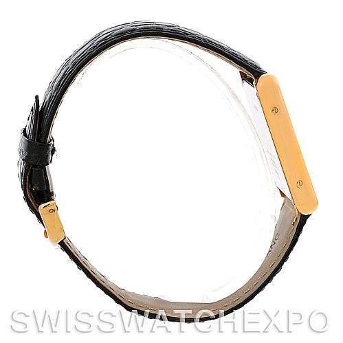 The image shows a side profile of the Cartier Tank Solo W1018855 Men
s Steel and Gold (two tone) Silver Dial W1018855 Men
s Steel and Gold (two tone) Silver Dial watch, highlighting the strap and the case.