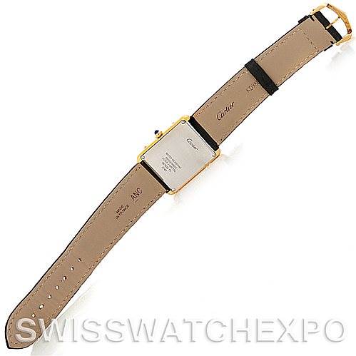 The image shows the underside view of a Cartier Tank Solo W1018855 Men
s Steel and Gold (two tone) Silver Dial W1018855 Men
s Steel and Gold (two tone) Silver Dial watch, highlighting its strap and case back details.