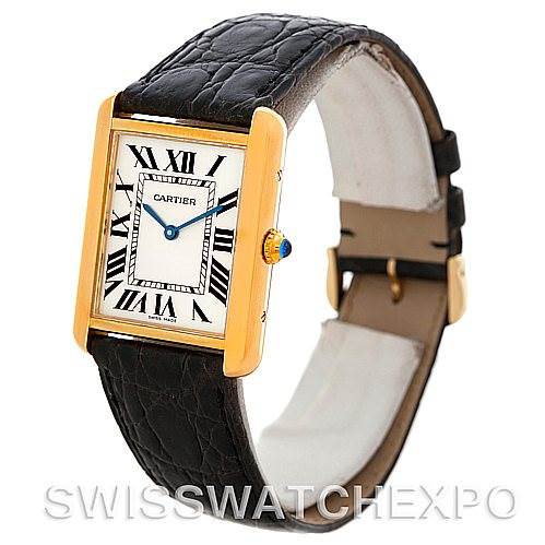 The image shows a side view of the Cartier Tank Solo W1018855 Men's Steel and Gold (two tone) Silver Dial W1018855 Men's Steel and Gold (two tone) Silver Dial watch, highlighting the face, the bezel, and the leather strap.