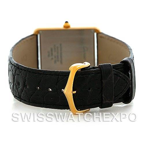 This image shows the back view of a Cartier Tank Solo W1018855 Men's Steel and Gold (two tone) Silver Dial W1018855 Men's Steel and Gold (two tone) Silver Dial watch, highlighting its buckle, strap, and case.