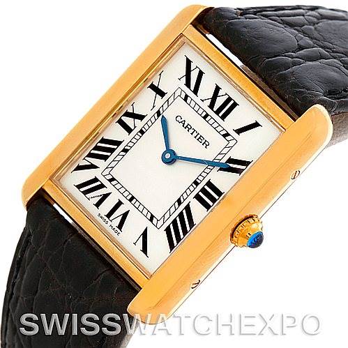 The image shows an angled view of the Cartier Tank Solo W1018855 Men's Steel and Gold (two tone) Silver Dial W1018855 Men's Steel and Gold (two tone) Silver Dial watch, highlighting its rectangular face, Roman numerals, and leather strap.